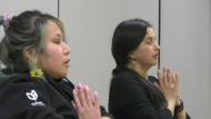 Shyla Gable (Right) leads a spiritually informed yoga class meant for Indigenous trauma survivors at the Mâmawêyatitân Centre in Regina. (Brianne Foley/CTV News)