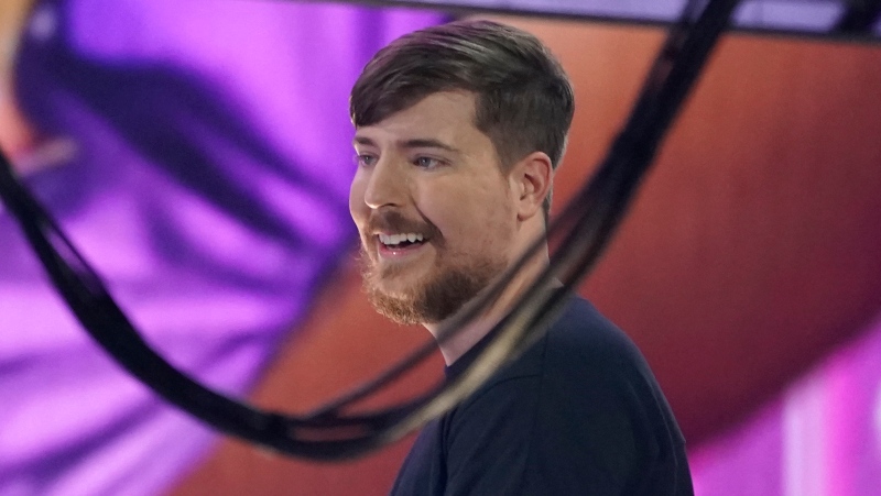 MrBeast, real name Jimmy Donaldson, accepts the award for favorite male creator at the Kids Choice Awards, April 9, 2022, at the Barker Hangar in Santa Monica, Calif. (AP Photo/Chris Pizzello)