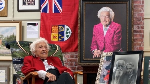 Hazel McCallion sits inside one of the exhibits that make up “Hazel: 100 Years of Memories” on its opening day. (Scott Lightfoot/CTV News Toronto)