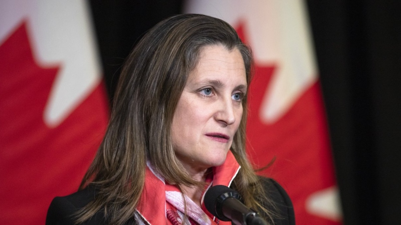 Minister of Finance and Deputy Prime Minister Chrystia Freeland speaks to the media at the Hamilton Convention Centre, in Hamilton, Ont., on Tuesday, January 24, 2023. The federal government failed to spend tens of billions of dollars in the last fiscal year on promised programs and services, including new military equipment, affordable housing and support for veterans. THE CANADIAN PRESS/Nick Iwanyshyn