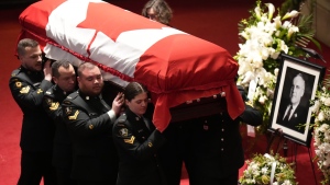 The casket of former Ontario lieutenant-governor David Onley is carried into the church for his state funeral in Toronto, Monday, Jan.30, 2023. THE CANADIAN PRESS/Nathan Denette