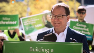 Ontario Green Party Leader Mike Schreiner smiles as supporters clap during a press conference at Bloor-Bedford Parkette in Toronto as part of his campaign tour, on Tuesday, May 17, 2022. THE CANADIAN PRESS/ Tijana Martin