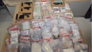 Toronto police have released this image of drugs and firearms seized during a robbery investigation.