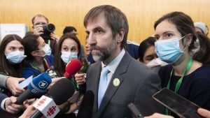 Steven Guilbeault, Minister of Environment and Climate Change of Canada speaks to reporters at the COP15 UN Biodiversity Conference in Montreal, Dec. 18, 2022. THE CANADIAN PRESS/Graham Hughes