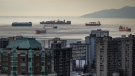 A condo tower and apartment buildings are seen in downtown and the West End of Vancouver, on Jan. 19, 2023. (Darryl Dyck / THE CANADIAN PRESS)