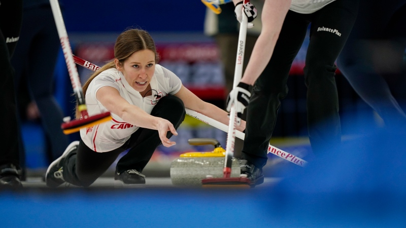 Canada's Kaitlyn Lawes throws a rock during a women's curling match against Sweden at the Beijing Winter Olympics Saturday, Feb. 12, 2022, in Beijing. (AP Photo/Brynn Anderson)