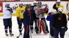 Katey Stone, head coach of Team USA women's team, gives instructions during practice at the IIHF Ice Hockey Women's World Championship in Ottawa, Sunday April, 7 2013. (THE CANADIAN PRESS/Fred Chartrand)