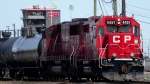 Canadian Pacific Railway trains sit idle on the train tracks due to the strike at the main CP Rail train yard in Toronto on Monday, March 21, 2022. (THE CANADIAN PRESS/Nathan Denette)