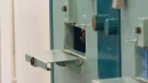 An inmate can be seen inside a segregation cell at the Collins Bay Institution in Kingston, Ont., on Tuesday, May 10, 2016. THE CANADIAN/Lars Hagberg