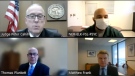 In this screen grab from video provided by the Minnesota Attorney General's Office, Judge Peter Cahill, Assistant Attorney General Matthew Frank, defense attorney Thomas Plunkett and his client former Minneapolis police Officer J. Alexander Kueng, upper right, appear remotely via Zoom for Kueng's sentencing in Hennepin County District Court in Minneapolis, Friday, Dec. 9, 2022. Kueng, who kneeled on George Floyd’s back while another officer kneeled on the Black man’s neck, was sentenced to 3 1/2 years in prison. (Courtesy of Minnesota Attorney General's Office via AP)