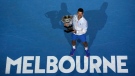 Novak Djokovic with the Norman Brookes Challenge Cup after his men's singles final win at the Australian Open, on Jan. 29, 2023. (Ng Han Guan / AP)