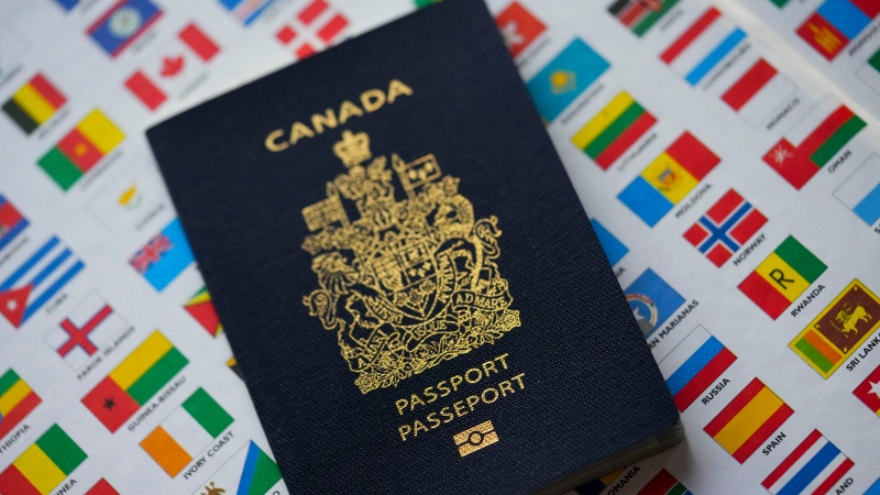 A Canadian passport is pictured in Ottawa on Tuesday, Jan. 17, 2023. THE CANADIAN PRESS/Sean Kilpatrick