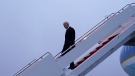 U.S. President Joe Biden walks down the steps of Air Force One at Andrews Air Force Base, Md., Tuesday, Jan. 31, 2023, after returning from a trip to New York for an event on infrastructure. (AP Photo/Susan Walsh)