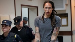 WNBA star and two-time Olympic gold medallist Brittney Griner is escorted from a courtroom after a hearing in Khimki just outside Moscow, Russia, Aug. 4, 2022. (AP Photo/Alexander Zemlianichenko, File) 