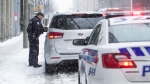 An Ottawa police officer is seen talking to a pulled over driver in this OPS image. (Ottawa Police Service/Twitter)