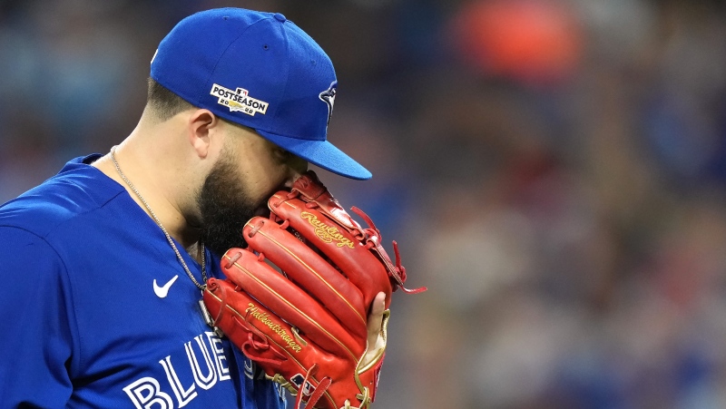 Toronto Blue Jays starting pitcher Alek Manoah (6) reacts as he walks back to the dugout after the top of the fourth inning American League wild card MLB postseason baseball action against the Seattle Mariners in Toronto on Friday, October 7, 2022. THE CANADIAN PRESS/Nathan Denette