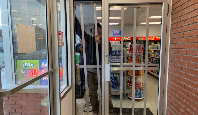 Bars are being installed at a convenience store in South Porcupine after it was been broken into several times in the past two weeks. (Lydia Chubak/CTV News)