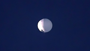 A high altitude balloon floats over Billings, Mont., on Wednesday, Feb. 1, 2023. (Larry Mayer/The Billings Gazette via AP)