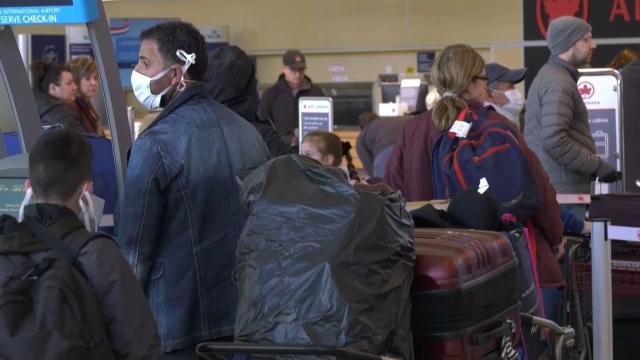 Passengers returning to Edmonton airport