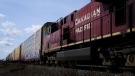 With a U.S. regulator poised to make its final decision within weeks, Canadian Pacific Railway Ltd.'s CEO says the company is "ready to roll" on its proposed merger with Kansas City Southern. Canadian Pacific Railway trains sit at the main CP Rail trainyard in Toronto on March 21, 2022. (THE CANADIAN PRESS/Nathan Denette)