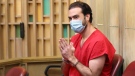 Pablo Lyle gestures toward family members as they appear in court at the Richard E. Gerstein Justice Building in Miami, on Monday, Dec. 12, 2022. (Carl Juste/Miami Herald via AP, Pool)