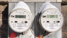 Electricity meters are shown on the side of homes in Montreal, Saturday, February 4, 2023. Hydro-Quebec has asked customers to reduce their energy consumption as the region is going through a period of extremely cold weather. THE CANADIAN PRESS/Graham Hughes
