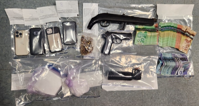 Police in Prince Albert found firearms, cash and cocaine at a home in that city. (Prince Albert Police Service)