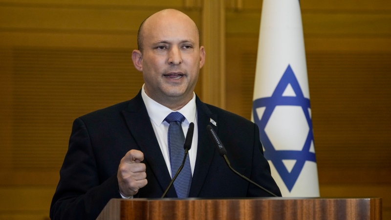 Then-Israeli Prime Minister Naftali Bennett delivers a statement at the Knesset, Israel's parliament, in Jerusalem on June 29, 2022. Bennett, a former Israeli prime minister who served briefly as a mediator at the start of Russia's war with Ukraine, said during an interview posted online Feb. 4, 2023 that he drew a promise from the Russian president not to kill his Ukrainian counterpart. (AP Photo/Tsafrir Abayov, File)