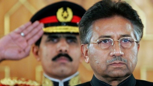 Pakistan's then-President Pervez Musharraf listens to the national anthem before being sworn in as the country's civilian president at President House in Islamabad, Pakistan on Nov. 29, 2007. An official said on Feb. 5, 2023 that Gen. Pervez Musharraf, Pakistan military ruler who backed the U.S. war in Afghanistan after 9/11, has died. (AP Photo/B.K.Bangash, File)