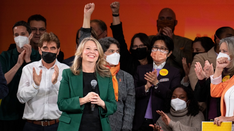 Marit Stiles stands with caucus members and supporters after her Ontario NDP Leadership is confirmed at the party’s showcase event in Toronto on Saturday February 4, 2023. THE CANADIAN PRESS/Chris Young