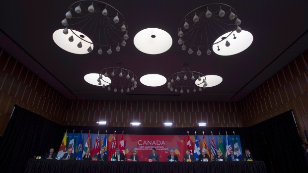 Canadian premiers listen to Prime Minister Justin Trudeau during the closing news conference at the First Ministers Meeting in Ottawa, on Oct. 3, 2017. (THE CANADIAN PRESS/Adrian Wyld)