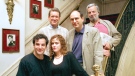 The original Broadway cast of "Sunday in the Park with George," Mandy Patinkin, Charles Kimbrough, top left, and Bernadette Peters, bottom right, join director James Lapine and composer-lyricist Stephen Sondheim, top right, at the Lyceum Theater in New York, May 14, 1994. (AP Photo/Mark Lennihan)