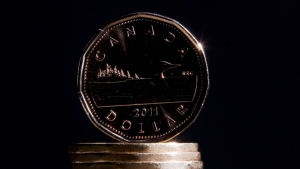 Canadian dollars are pictured in Vancouver, Sept. 22, 2011. THE CANADIAN PRESS/Jonathan Hayward
