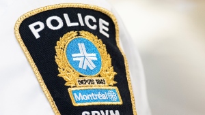 A Montreal police badge is shown during a news conference in Montreal, Thursday, August 4, 2022. THE CANADIAN PRESS/Graham Hughes