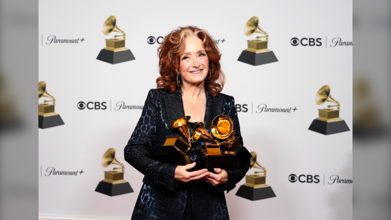 Bonnie Raitt, winner of the awards for best Song of the Year "Just Like That," Best American Roots Song "Just Like That" and Best Americana Performance of "Made Up My Mind," poses in the press room at the 65th annual Grammy Awards on Sunday, Feb. 5, 2023, in Los Angeles. (AP Photo/Jae C. Hong)