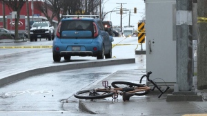 The intersection remained behind police tape for much of the morning while officers investigated. (CTV News)