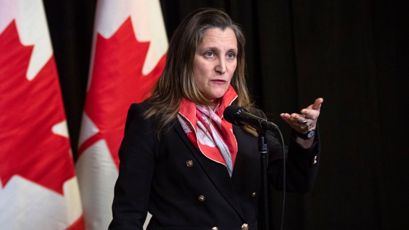 Minister of Finance and Deputy Prime Minister Chrystia Freeland speaks to the media at the Hamilton Convention Centre, in Hamilton, Ont., during the second day of meetings at the Liberal Cabinet retreat, on Tuesday, January 24, 2023. THE CANADIAN PRESS/Nick Iwanyshyn