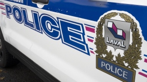 The Laval police logo is seen on a police car, Tuesday, Oct. 18, 2022, in Laval, Que. THE CANADIAN PRESS/Ryan Remiorz