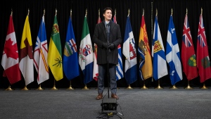 Prime Minister Justin Trudeau speaks with media as he arrives for a health care meeting with premiers, Tuesday, February 7, 2023 in Ottawa. THE CANADIAN PRESS/Adrian Wyld