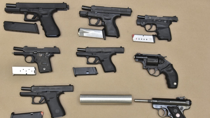 Calgary police say 36 charges have been laid against one man and eight unlawfully possessed firearms were seized following a two-month-long investigation. (Calgary Police Service handout) 