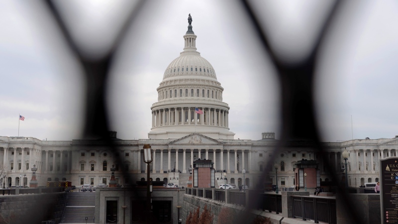 A newly installed fence around the U.S. Capitol is seen, on Tuesday, Feb. 7, 2023, in Washington, ahead of U.S. President Biden's State of the Union address on Tuesday. (AP Photo/Jose Luis Magana) 