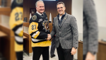 City of Brantford councillor Richard Carpenter wears a Bulldogs jersey in council chambers Tuesday night. (Twitter/City of Brantford)