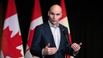 Minister of Health Jean-Yves Duclos speaks to the media at the Hamilton Convention Centre, in Hamilton, Ont., during the Liberal Cabinet retreat, on Monday, January 23, 2023. THE CANADIAN PRESS/Nick Iwanyshyn