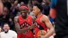 Toronto Raptors forward Pascal Siakam (43) and teammate Scottie Barnes (4) celebrate their 119-114 win against the Philadelphia 76ers after NBA basketball action in Toronto, Thursday, April 7, 2022. THE CANADIAN PRESS/Frank Gunn