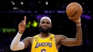 Los Angeles Lakers forward LeBron James gestures after passing Kareem Abdul-Jabbar to become the NBA's all-time leading scorer during the second half of an NBA basketball game against the Oklahoma City Thunder Tuesday, Feb. 7, 2023, in Los Angeles. (AP Photo/Ashley Landis)