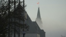 Parliament Hill and the Supreme Court of Canada are shrouded in fog in Ottawa, on Friday, Nov 4, 2022. The federal government is being urged to follow through with its commitment to develop a Black Canadian justice strategy. (THE CANADIAN PRESS/Sean Kilpatrick)