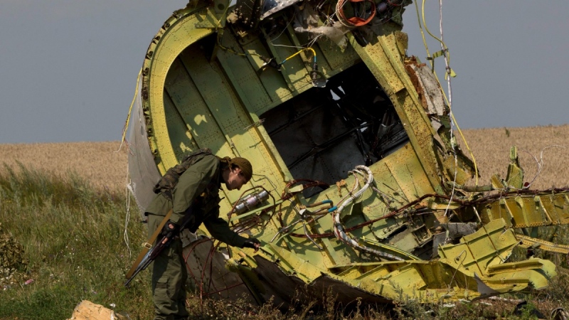 The MH17 wreckage at the crash site of Malaysia Airlines Flight 17, near the village of Hrabove, eastern Ukraine, on July 22, 2014. (Vadim Ghirda / AP) 