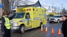 An ambulance leaves the scene after a bus crashed into a daycare centre in Laval, Que., February 8, 2023.THE CANADIAN PRESS/Ryan Remiorz