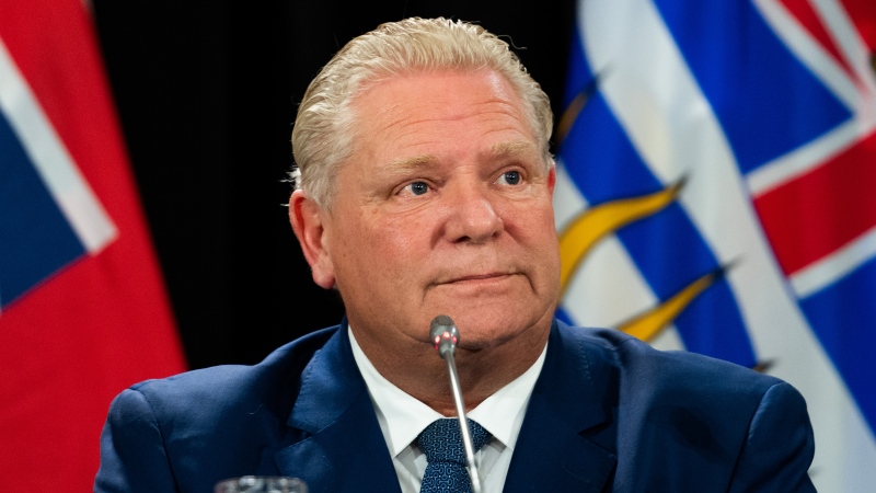 Ontario Premier Doug Ford listens to members of the media during a press conference in Ottawa, on Tuesday, Feb. 7, 2023. THE CANADIAN PRESS/Spencer Colby 