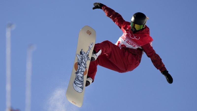 Canada's Brooke D'Hondt trains on the halfpipe course at the 2022 Winter Olympics, Tuesday, Feb. 8, 2022, in Zhangjiakou, China. D'Hondt has dropped into Calgary's halfpipe a 10-minute drive from her house more times than she can count, but the snowboarder competes in her first hometown World Cup there starting Thursday. (THE CANADIAN PRESS/AP/Francisco Seco)